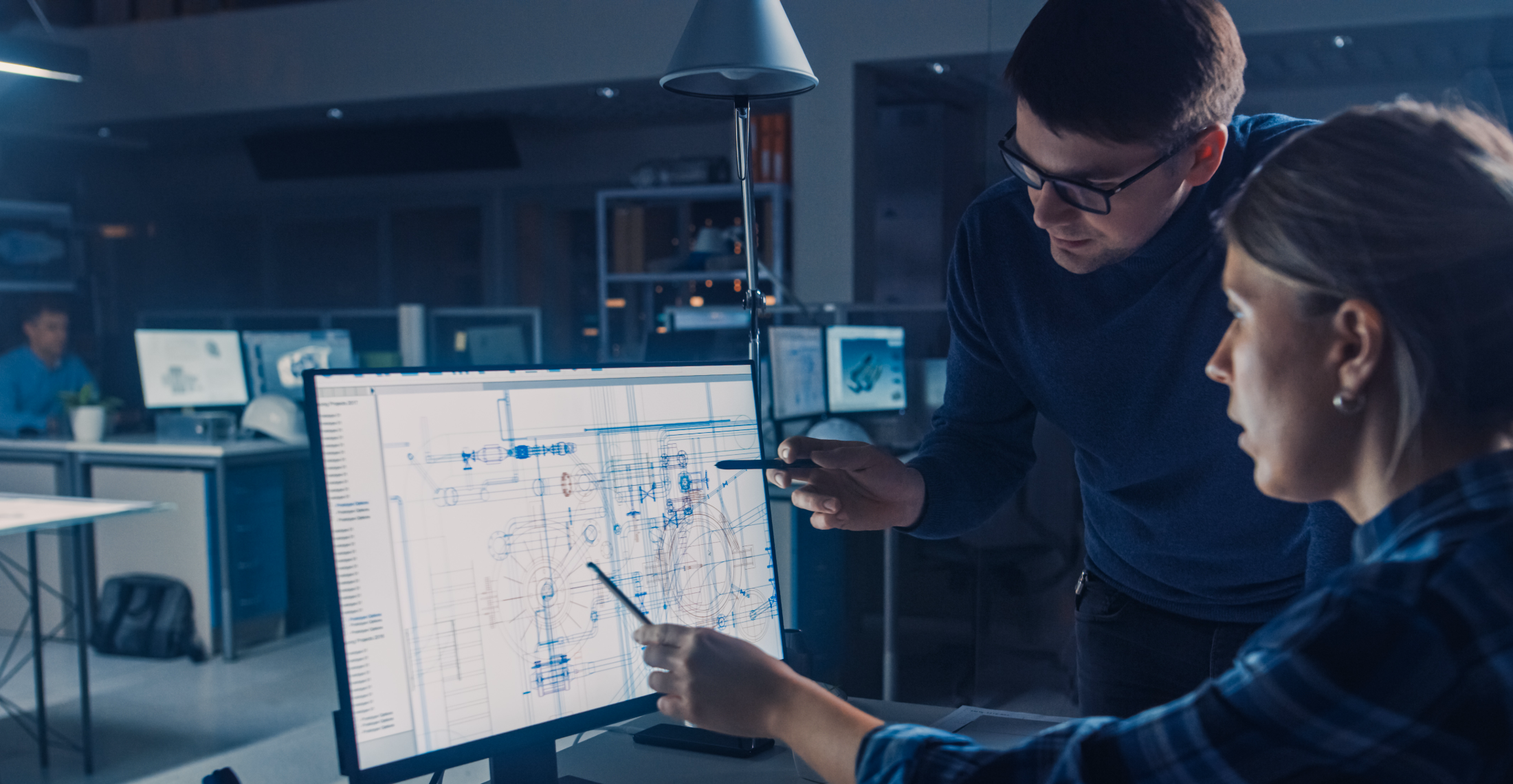 two engineers working together in office